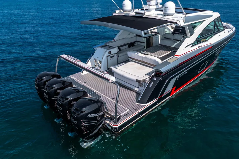  Yacht Photos Pics 2017 Formula 430 All Sport Crossover boat with four Mercury engines on open water.