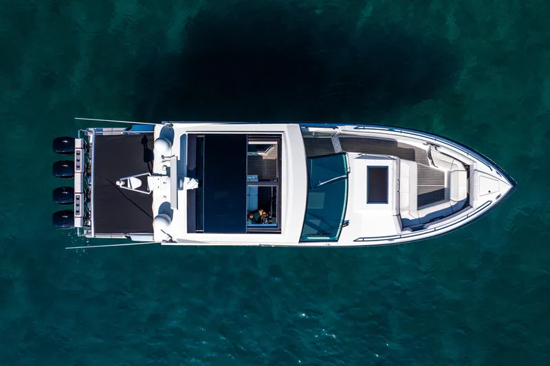  Yacht Photos Pics Aerial view of 2017 Formula 430 All Sport Crossover boat on clear water.
