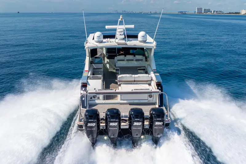  Yacht Photos Pics 2017 Formula 430 All Sport Crossover boat cruising on open water with four powerful engines.