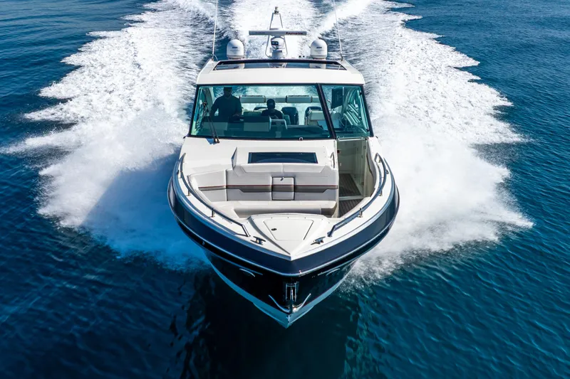  Yacht Photos Pics 2017 Formula 430 All Sport Crossover cruising on open water, showcasing sleek design and performance.