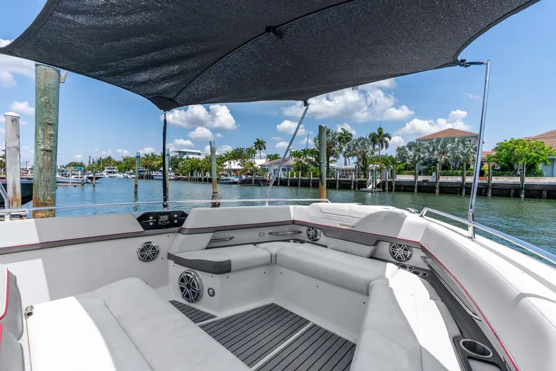  Yacht Photos Pics 2017 Formula 430 All Sport Crossover boat with shaded seating area on a sunny day.