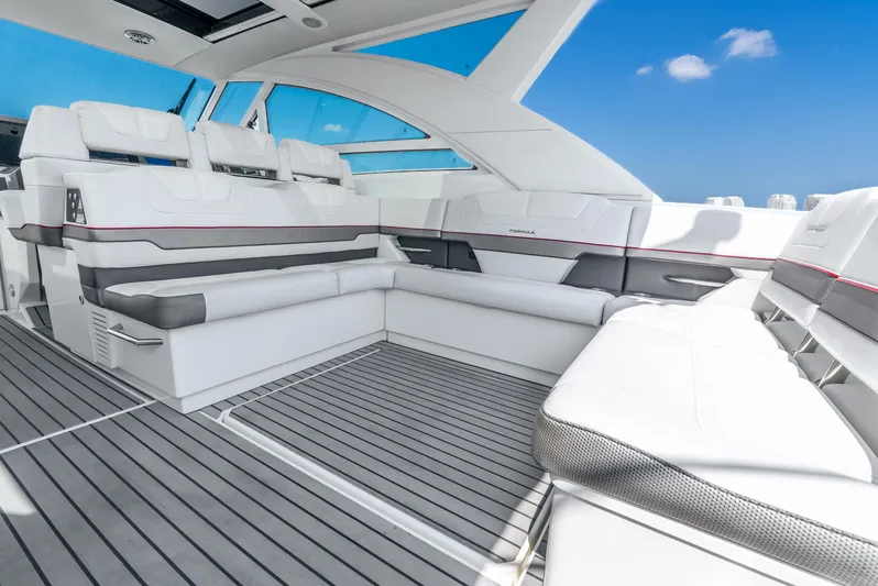  Yacht Photos Pics Luxurious interior of 2017 Formula 430 All Sport Crossover yacht with white seating and sleek design.