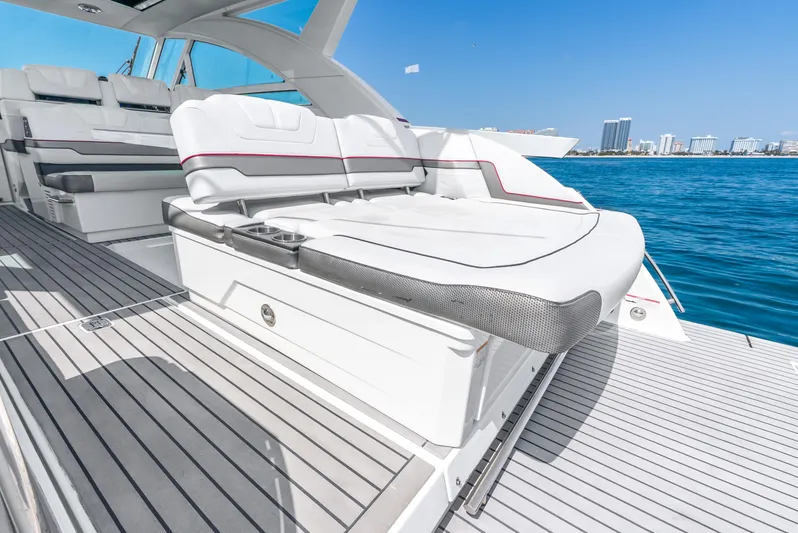  Yacht Photos Pics 2017 Formula 430 All Sport Crossover yacht with luxurious seating, docked by the ocean.