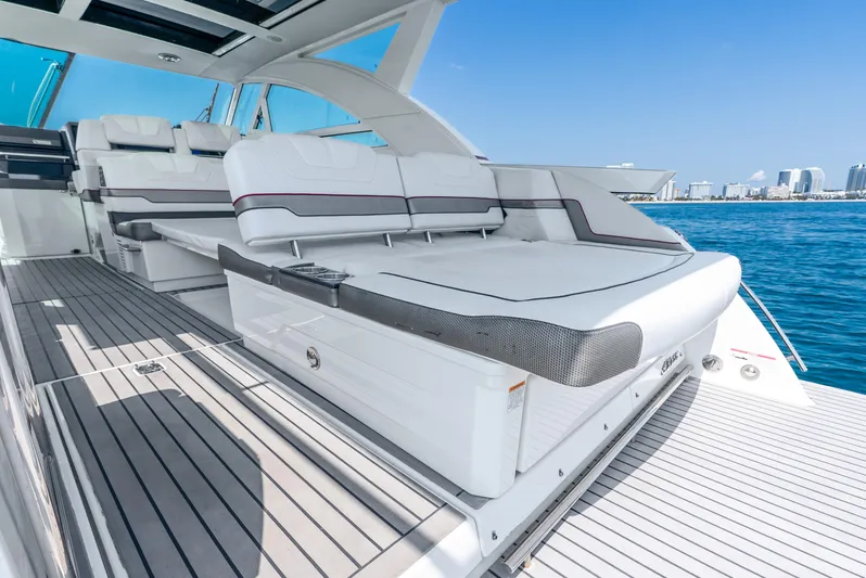  Yacht Photos Pics 2017 Formula 430 All Sport Crossover yacht with luxurious seating, docked by the ocean.