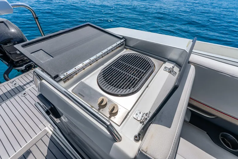  Yacht Photos Pics Outdoor grill on 2017 Formula 430 All Sport Crossover boat, ocean in background.