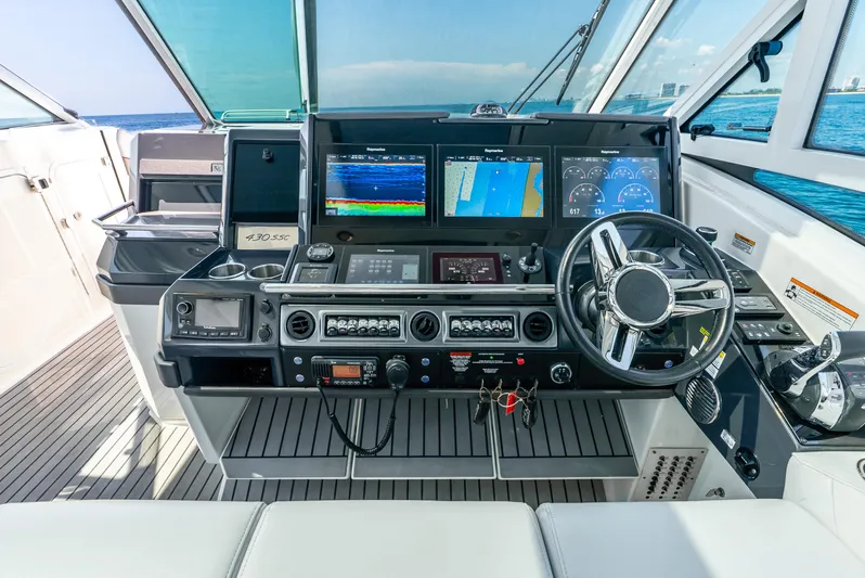  Yacht Photos Pics 2017 Formula 430 All Sport Crossover helm with advanced navigation displays and controls.
