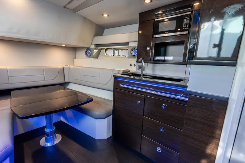  Yacht Photos Pics 2017 Formula 430 All Sport Crossover interior with modern kitchen and seating area.