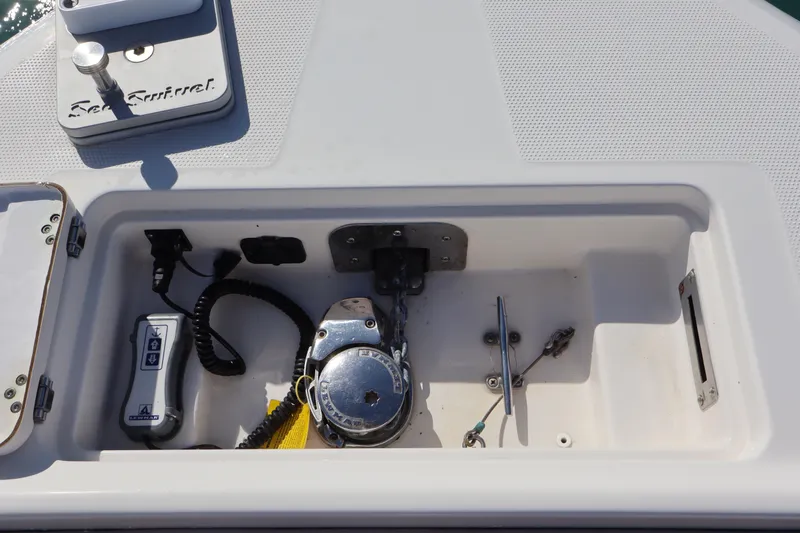  Yacht Photos Pics Anchor compartment of 2017 Sailfish 320 CC boat with winch and control panel.