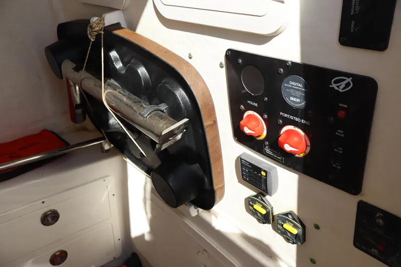  Yacht Photos Pics Control panel and equipment inside a 2017 Sailfish 320 CC boat.