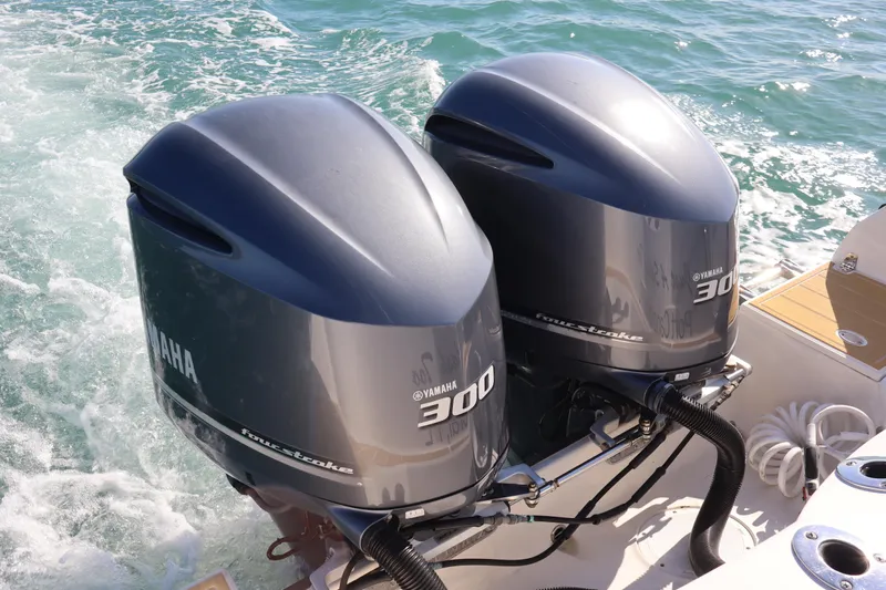  Yacht Photos Pics Twin Yamaha 300 outboard engines on 2017 Sailfish 320 CC boat in ocean.