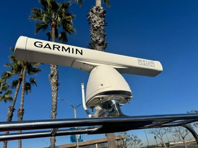  Yacht Photos Pics Garmin xHD2 radar on 2022 Allmand 31 RIB boat, clear blue sky background.