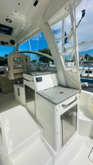  Yacht Photos Pics 2018 Boston Whaler 345 Conquest interior with sleek design and modern amenities.