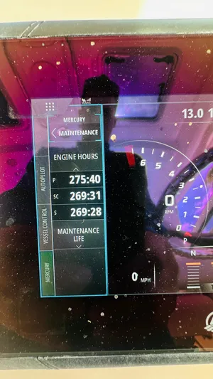  Yacht Photos Pics Display screen showing engine hours on a 2018 Boston Whaler 345 Conquest boat.