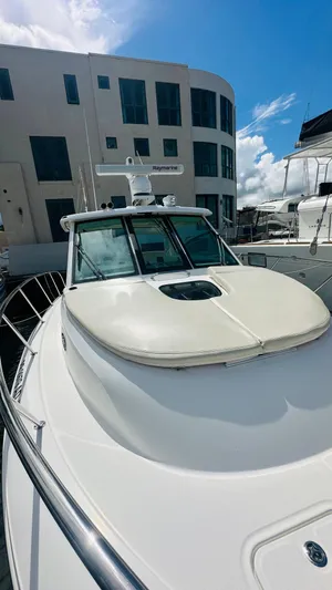  Yacht Photos Pics 2018 Boston Whaler 345 Conquest docked, showcasing sleek design and modern features.