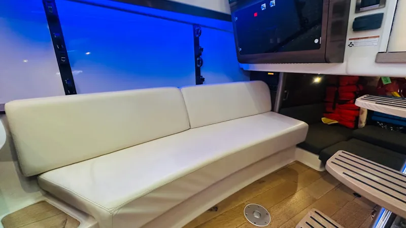  Yacht Photos Pics Interior of 2018 Boston Whaler 345 Conquest with white seating and modern design.