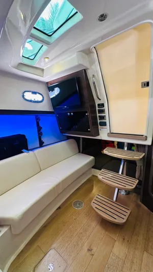  Yacht Photos Pics Interior of 2018 Boston Whaler 345 Conquest with modern seating and entertainment system.