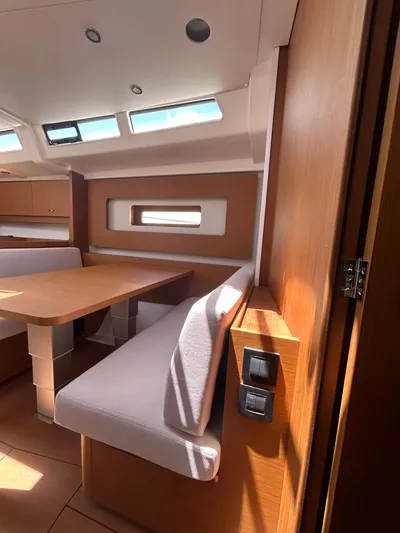  Yacht Photos Pics Interior of 2023 Beneteau First 44 yacht with modern seating and natural light.