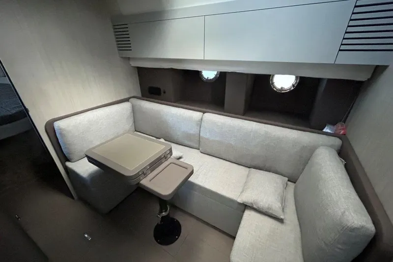  Yacht Photos Pics Luxurious interior of 2025 Cranchi M44HT yacht with cozy seating and modern design.