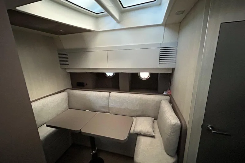  Yacht Photos Pics Interior of 2025 Cranchi M44HT yacht with cozy seating and modern design.