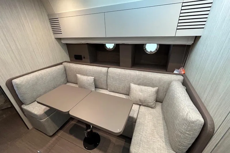  Yacht Photos Pics Luxurious interior of 2025 Cranchi M44HT yacht with cozy seating and modern design.