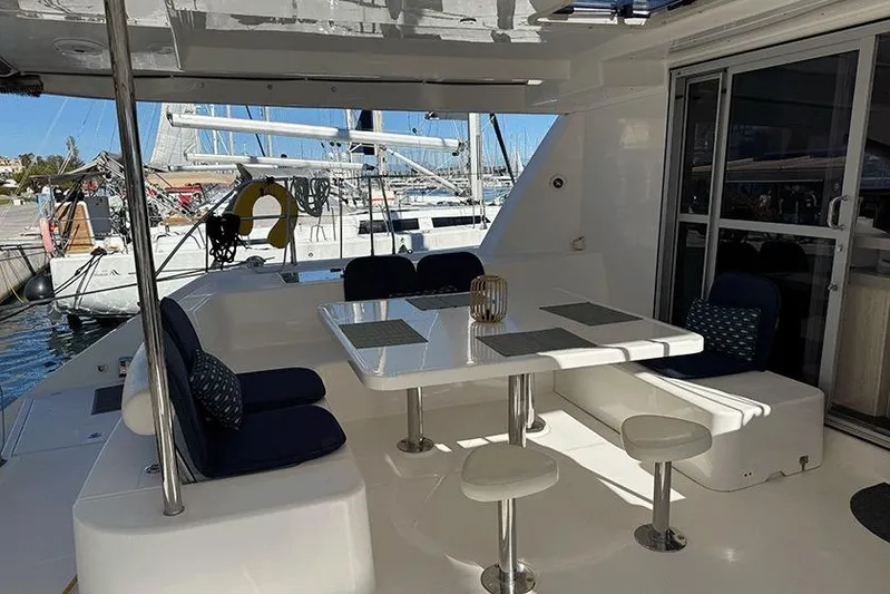  Yacht Photos Pics Luxurious Leopard 48 yacht interior with dining area, 2017 model, docked at marina.