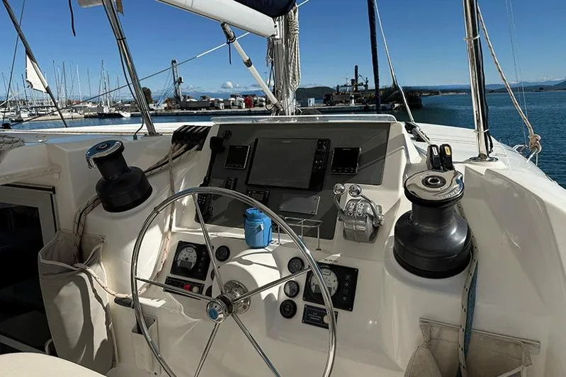  Yacht Photos Pics Cockpit of 2017 Leopard 48 yacht with steering wheel and navigation instruments.