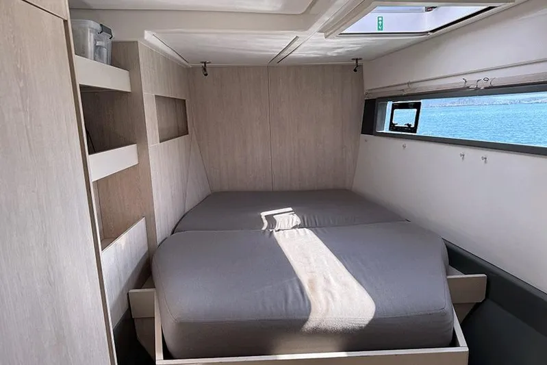  Yacht Photos Pics Modern bedroom interior on 2017 Leopard 48 yacht with ocean view.