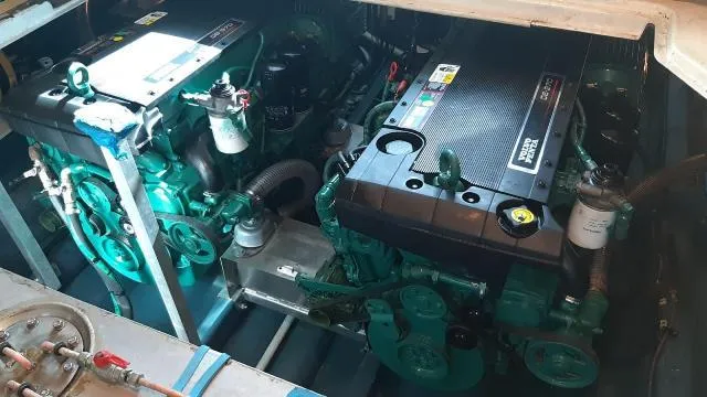  Yacht Photos Pics Engine room of 2004 Cranchi Atlantique 40 yacht, featuring dual marine engines.