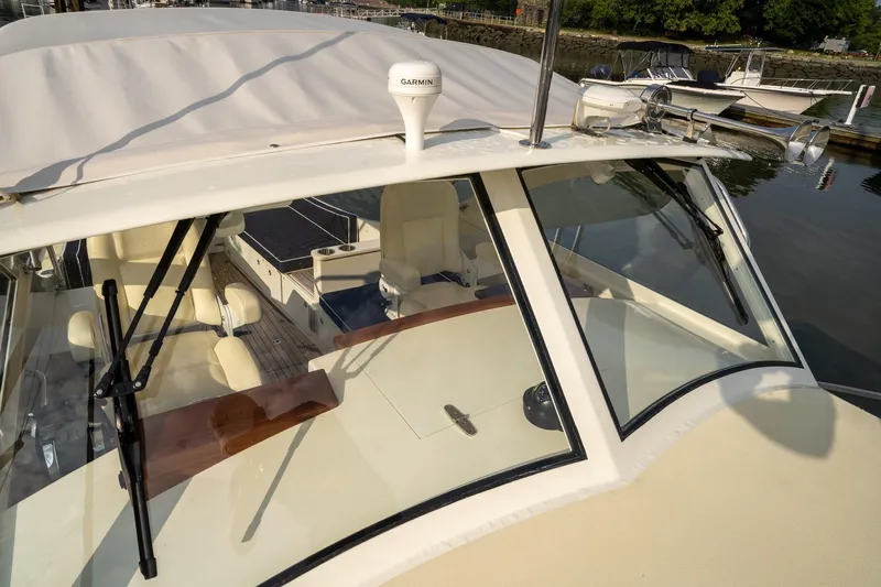 Marcy Yacht Photos Pics 2021 Brooklin Boat Yard 32 Express with sleek design, docked at marina.