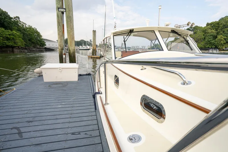 Marcy Yacht Photos Pics Brooklin Boat Yard 32 Express 2021 docked, showcasing sleek design and craftsmanship.
