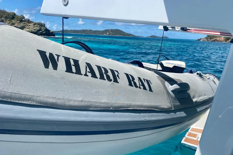 Lazy Lightning Yacht Photos Pics Inflatable boat "Wharf Rat" on clear blue water, Vision 444, 2021 model.