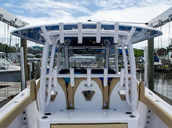  Yacht Photos Pics 2025 Sportsman Open 352 Center Console boat docked, featuring modern seating and sleek design.