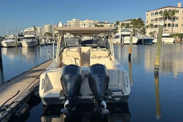 Yacht Photos Pics 2016 Grady-White Freedom 307 boat docked at marina with twin engines.