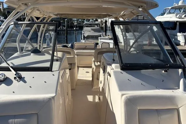  Yacht Photos Pics 2016 Grady-White Freedom 307 boat interior with open cockpit and seating.