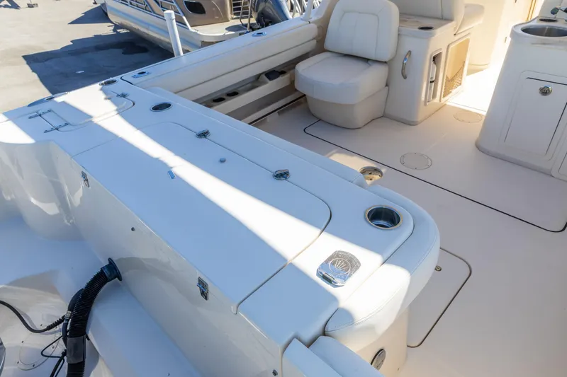  Yacht Photos Pics 2016 Grady-White Freedom 307 boat interior with seating and storage compartments.