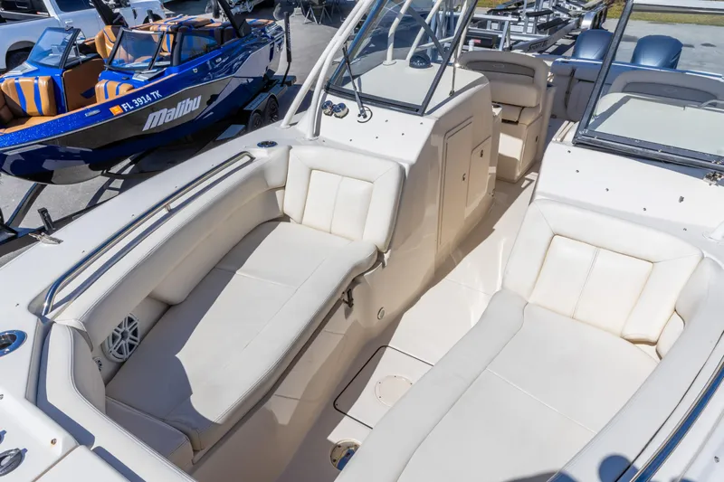  Yacht Photos Pics 2016 Grady-White Freedom 307 boat interior with white seating and windshield.