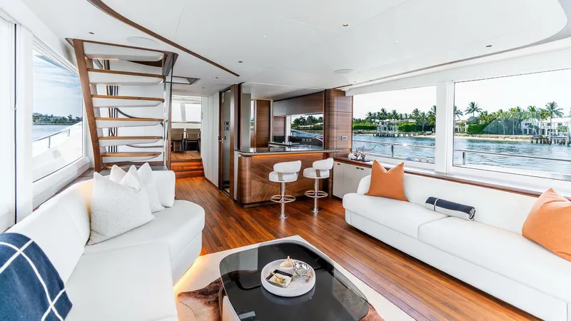Cosa Bella Yacht Photos Pics Luxurious interior of 2024 Princess X80 yacht with modern furnishings and panoramic windows.