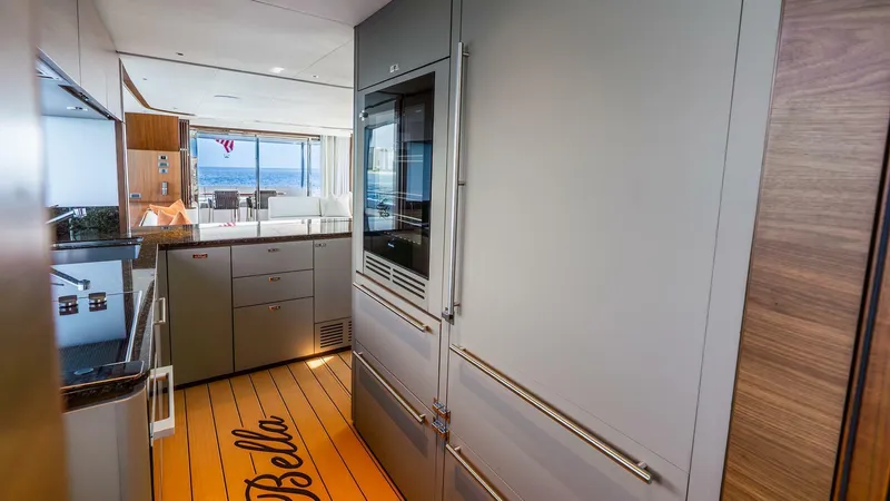 Cosa Bella Yacht Photos Pics Luxurious kitchen interior of 2024 Princess X80 yacht with ocean view.