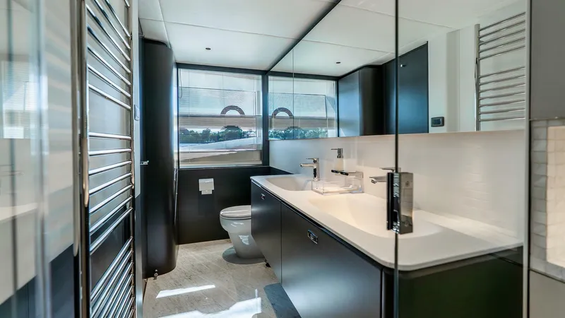 Cosa Bella Yacht Photos Pics Luxurious bathroom interior of 2024 Princess X80 yacht, featuring modern fixtures and sleek design.