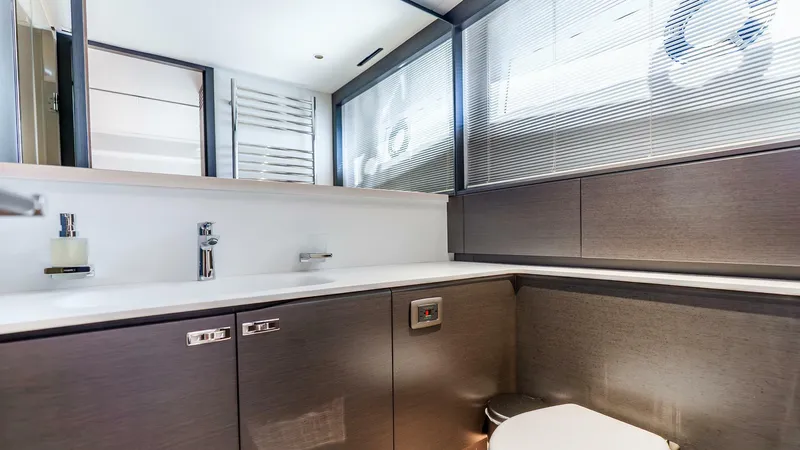 Cosa Bella Yacht Photos Pics Luxurious bathroom interior of 2024 Princess X80 yacht, featuring modern fixtures and sleek design.