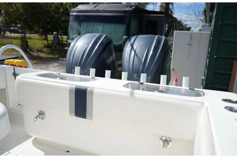  Yacht Photos Pics 2000 Contender 36 Open boat with dual Yamaha outboard engines, docked outdoors.