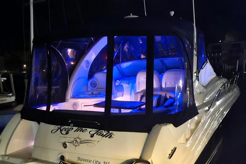 Keep The Faith Yacht Photos Pics 2005 Sea Ray 340 Sundancer yacht with blue interior lighting at night, Traverse City.