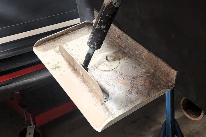 Keep The Faith Yacht Photos Pics Trim tab of a 2005 Sea Ray 340 Sundancer boat on a stand.