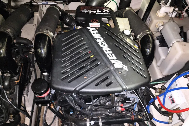 Keep The Faith Yacht Photos Pics Engine compartment of a 2005 Sea Ray 340 Sundancer with a MerCruiser 8.1S engine.