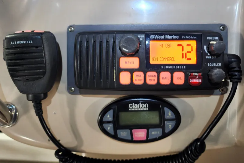 Keep The Faith Yacht Photos Pics VHF marine radio and Clarion audio control on 2005 Sea Ray 340 Sundancer.