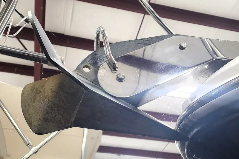 Keep The Faith Yacht Photos Pics Anchor detail of 2005 Sea Ray 340 Sundancer boat in a storage facility.