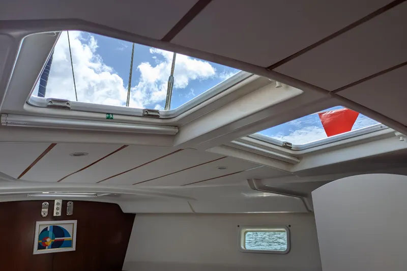 Laylay Yacht Photos Pics Interior view of 2003 Beneteau Oceanis Clipper 473 sailboat with open skylight.