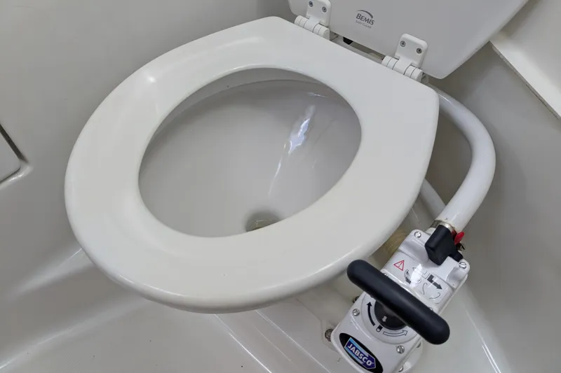 Laylay Yacht Photos Pics Marine toilet in 2003 Beneteau Oceanis Clipper 473 yacht bathroom.