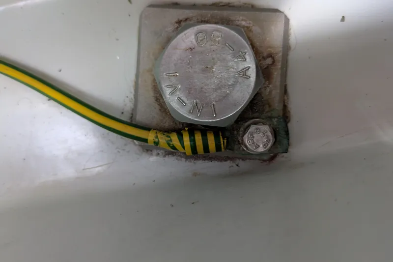 Laylay Yacht Photos Pics Close-up of a bolt and grounding wire on a 2003 Beneteau Oceanis Clipper 473.