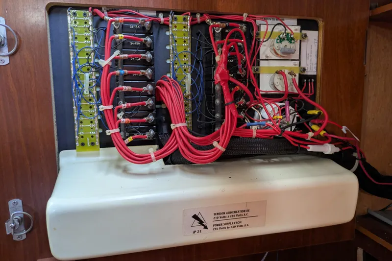 Laylay Yacht Photos Pics Electrical panel of a 2003 Beneteau Oceanis Clipper 473 sailboat with wiring and fuses.